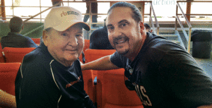 Gene Fisher, left, attended a number of equipment auctions with his son, Tommy, as he prepared him to lead Fisher Industries. Photo: Fisher Industries